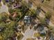 Aerial view of the house and surrounding cul-de-sac at 1406 Chamberlain Loop, Lake Wales, FL 33853