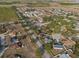 Aerial view showcasing the property's location near a lake at 1406 Chamberlain Loop, Lake Wales, FL 33853
