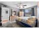 Comfortable bedroom with ceiling fan and large closet at 1600 W Lake Parker Dr # C25, Lakeland, FL 33805