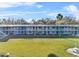 Condo building with pool and lake view at 1600 W Lake Parker Dr # C25, Lakeland, FL 33805