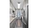 Modern kitchen with gray cabinets, stainless steel appliances at 1600 W Lake Parker Dr # C25, Lakeland, FL 33805