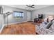 Bright living room with water view, hardwood floors, and comfy seating at 1600 W Lake Parker Dr # C25, Lakeland, FL 33805