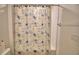 Clean bathroom with shower/tub and patterned curtain at 1713 Yellow Trl, Lakeland, FL 33801