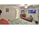 Bedroom with a double bed, dresser and large TV at 1713 Yellow Trl, Lakeland, FL 33801