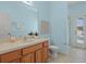Light blue bathroom with pool view and shower at 176 Brookshire Dr, Lake Wales, FL 33898