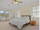 Spacious main bedroom with a king-size bed and plenty of natural light at 176 Brookshire Dr, Lake Wales, FL 33898