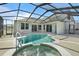 Enjoy this lovely pool and spa with screened enclosure at 176 Brookshire Dr, Lake Wales, FL 33898