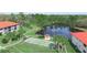 Beautiful aerial view of community pond and lush landscaping at 2002 Granada Ct # 1, Lake Wales, FL 33898