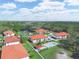 Bird's eye view of the condo community with a pool, gazebo, and beautifully landscaped grounds at 2002 Granada Ct # 1, Lake Wales, FL 33898