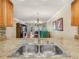 Bright and airy kitchen view through to living room at 2002 Granada Ct # 1, Lake Wales, FL 33898