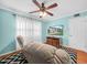 Cozy living room with neutral tones and a large television at 2002 Granada Ct # 1, Lake Wales, FL 33898
