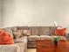 Comfortable sectional sofa featuring decorative pillows and a dark wood coffee table at 2002 Granada Ct # 1, Lake Wales, FL 33898