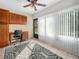 Sunroom featuring a desk, storage cabinets, and large windows at 2002 Granada Ct # 1, Lake Wales, FL 33898