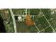 Aerial view displaying the property lines of the home and surrounding natural landscape at 208 Limpkin Ln, Frostproof, FL 33843