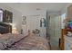 Bedroom with a zebra-print comforter and white dresser at 208 Limpkin Ln, Frostproof, FL 33843