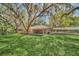 Home with hammock and covered patio at 21113 Kissimmee Shores Rd, Lake Wales, FL 33898