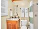 Charming bathroom with wood vanity and granite countertop at 21113 Kissimmee Shores Rd, Lake Wales, FL 33898