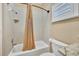 Simple bathroom with shower/tub combo and beige tile at 21113 Kissimmee Shores Rd, Lake Wales, FL 33898