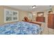 Bright bedroom with a comfortable bed and plenty of light at 21113 Kissimmee Shores Rd, Lake Wales, FL 33898
