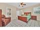 Spacious bedroom with a large bed and en-suite bathroom at 21113 Kissimmee Shores Rd, Lake Wales, FL 33898