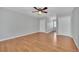Simple bedroom with light walls and wood-look flooring at 21113 Kissimmee Shores Rd, Lake Wales, FL 33898