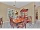 Formal dining room with large table and hutch at 21113 Kissimmee Shores Rd, Lake Wales, FL 33898