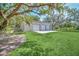 Detached three-car garage with concrete pad at 21113 Kissimmee Shores Rd, Lake Wales, FL 33898