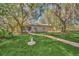 House front with walkway and landscaping at 21113 Kissimmee Shores Rd, Lake Wales, FL 33898