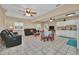 Open floor plan with kitchen, living area, and dining space at 21113 Kissimmee Shores Rd, Lake Wales, FL 33898