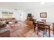 Open living and dining area with hardwood floors at 2330 Park Ave, Indian Lake Estates, FL 33855