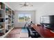 Home office with built-in shelving, large desk, and a view at 2330 Park Ave, Indian Lake Estates, FL 33855