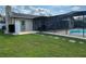 Relaxing pool area with stone pathway at 2400 Crump Rd, Winter Haven, FL 33881