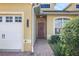 Front entrance with red door and brick walkway at 2739 Rutledge Ct, Winter Haven, FL 33884