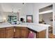 Modern kitchen features wood cabinets, white countertops, and stainless steel appliances at 2739 Rutledge Ct, Winter Haven, FL 33884
