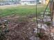 Large backyard with grassy area and a screened porch at 2790 Avenue L Nw, Winter Haven, FL 33881