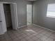 Bedroom with tile floors, large closet and access to bath at 2790 Avenue L Nw, Winter Haven, FL 33881