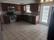 Modern kitchen with stainless steel appliances and ample cabinetry at 2790 Avenue L Nw, Winter Haven, FL 33881