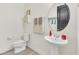 Powder room with pedestal sink and toilet at 2821 Mead Ave, St Cloud, FL 34771