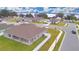 New construction homes in a lakeside community with manicured lawns and convenient street access at 304 Denna Ln, Auburndale, FL 33823