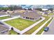 Aerial view of a home showcasing a fenced-in backyard, offering privacy and space for outdoor activities at 304 Denna Ln, Auburndale, FL 33823