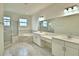 Bright bathroom featuring double vanity, garden tub, and large walk-in shower at 304 Denna Ln, Auburndale, FL 33823