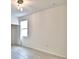Bedroom featuring a closet and a window at 304 Denna Ln, Auburndale, FL 33823