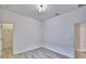 Spacious bedroom with light walls and wood-look floors at 304 Denna Ln, Auburndale, FL 33823