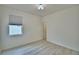 This bedroom features vinyl floors, a window, recessed lights and plenty of natural light at 304 Denna Ln, Auburndale, FL 33823