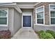 Double front doors with sidelights leading to the entryway at 304 Denna Ln, Auburndale, FL 33823