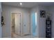 Bright hallway with access to bathroom and bedroom at 3112 St Charles Pl, Winter Haven, FL 33884