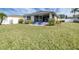 Large grassy backyard with home view at 3445 Raleigh Dr, Winter Haven, FL 33884