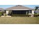 Home features a screened patio, perfect for outdoor relaxation at 3926 Bedford Ave, Winter Haven, FL 33884