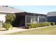 Home features a screened patio, perfect for outdoor relaxation at 3926 Bedford Ave, Winter Haven, FL 33884