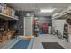 Well-organized garage space with storage shelves, tool chests, and ample room for parking and projects at 3926 Bedford Ave, Winter Haven, FL 33884